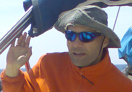 A person wearing sunglasses and a hat

AI-generated content may be incorrect.