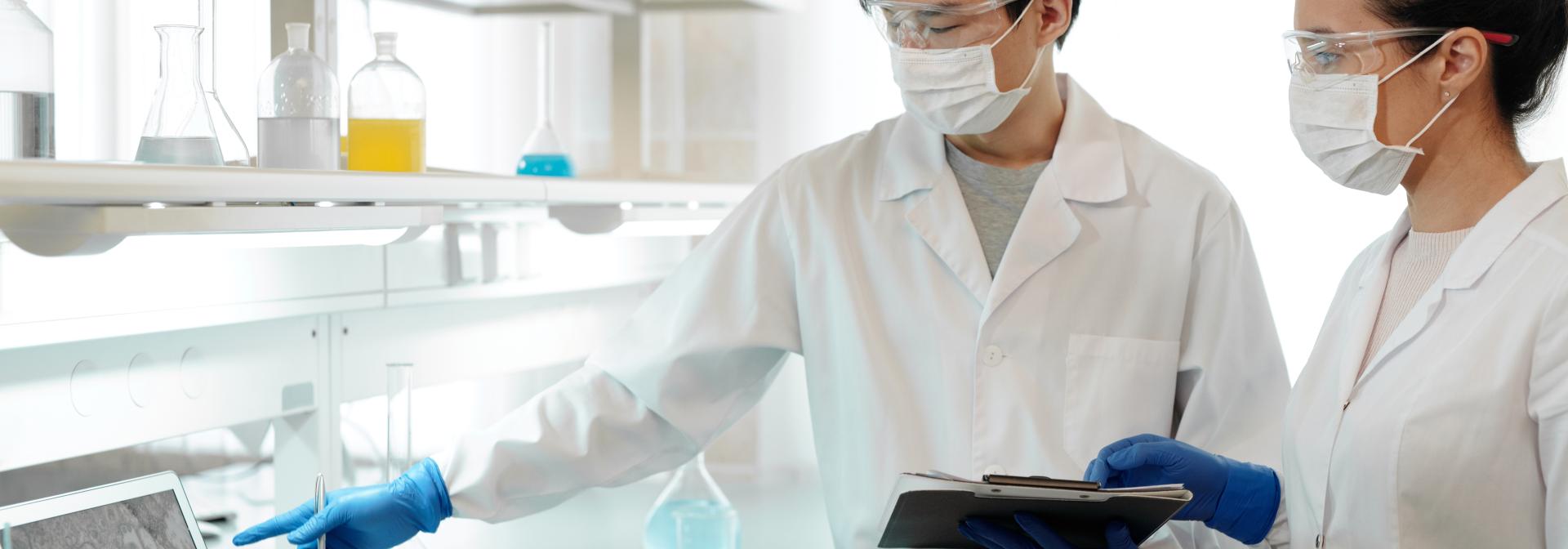 Two Scientists Working Inside the Laboratory